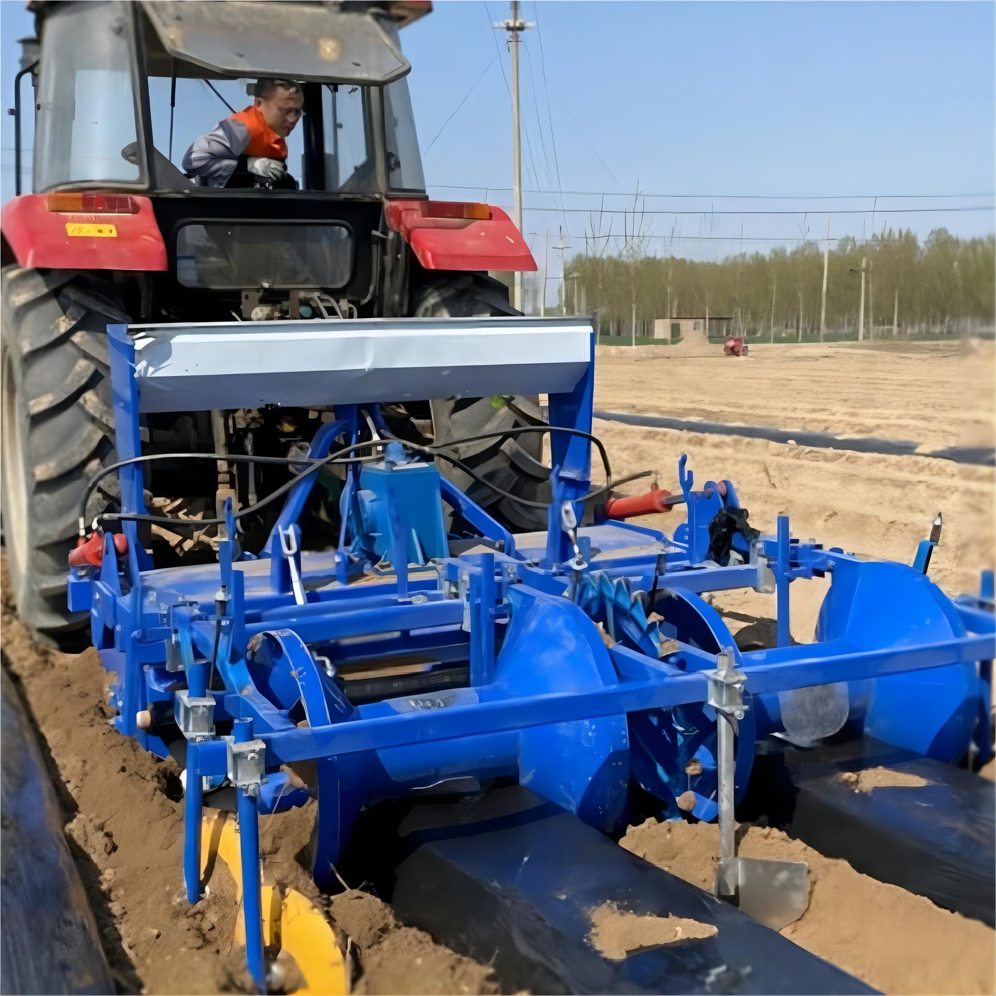 Field — mounted on tractor, working sandy ridge