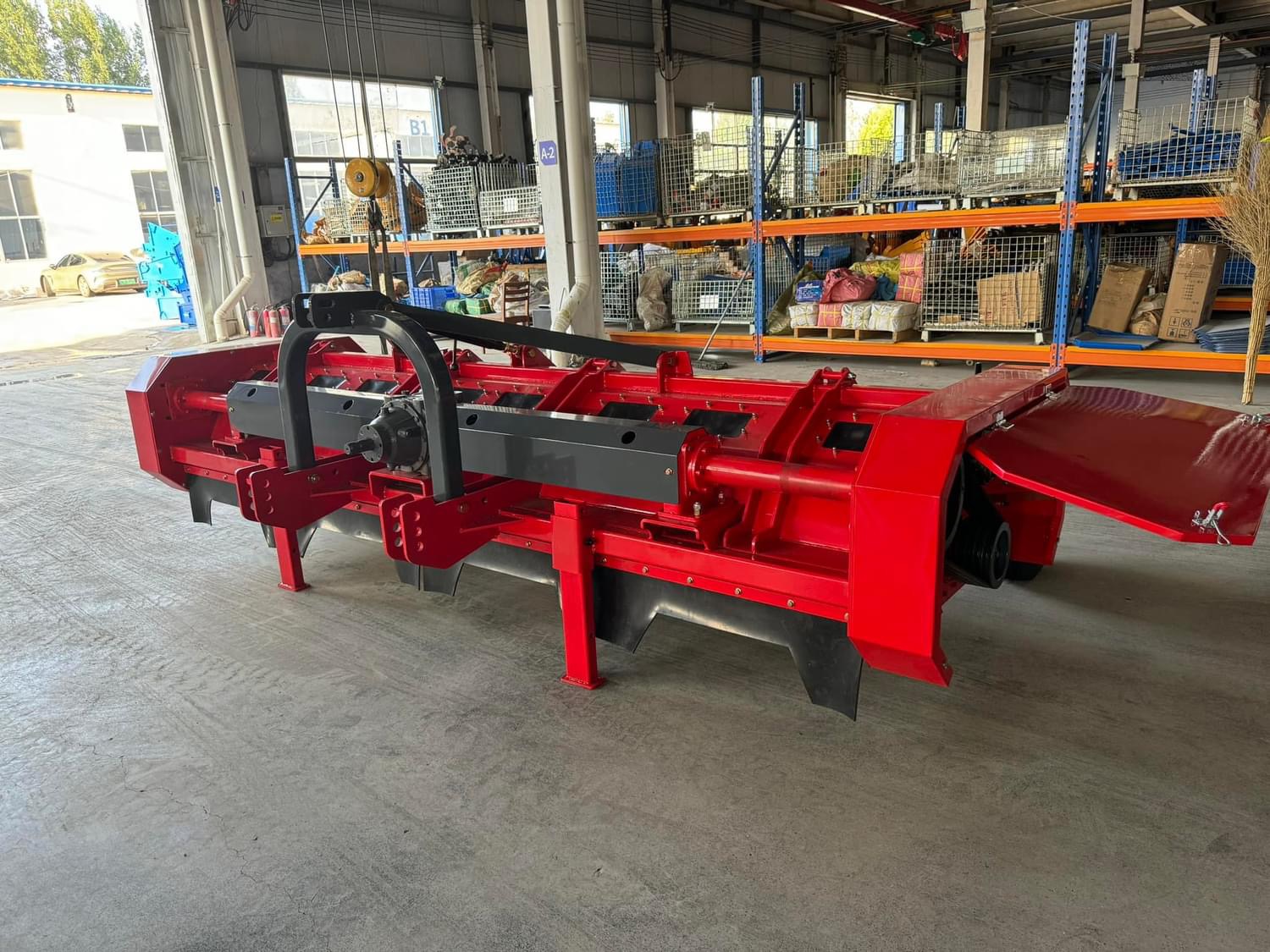 Backside view — central frame beam, gearbox and support legs