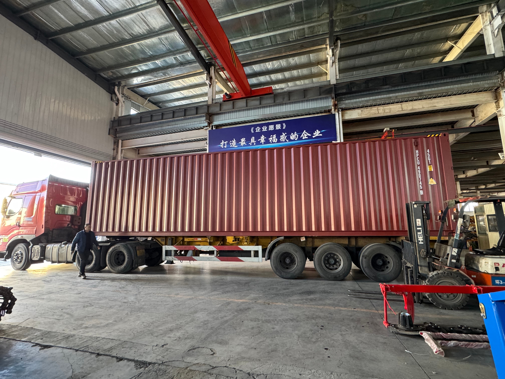Loaded container on flatbed trailer departing the Ningjin factory for Qingdao port.