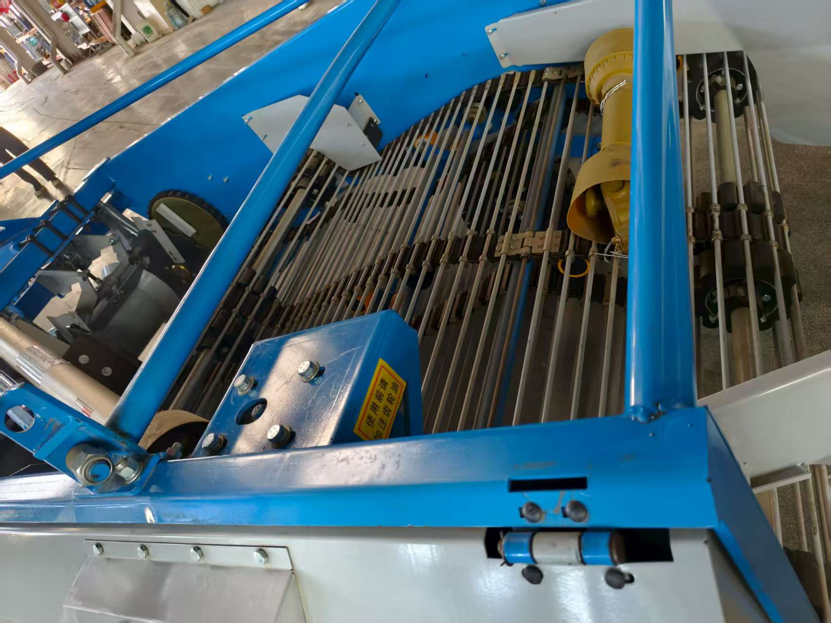 Interior conveyor view — rod bed and drive section
