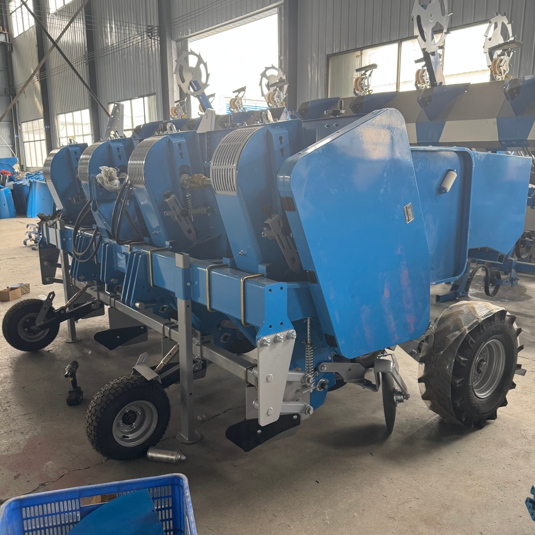 Metering drive side — cup-feed assemblies and chain covers