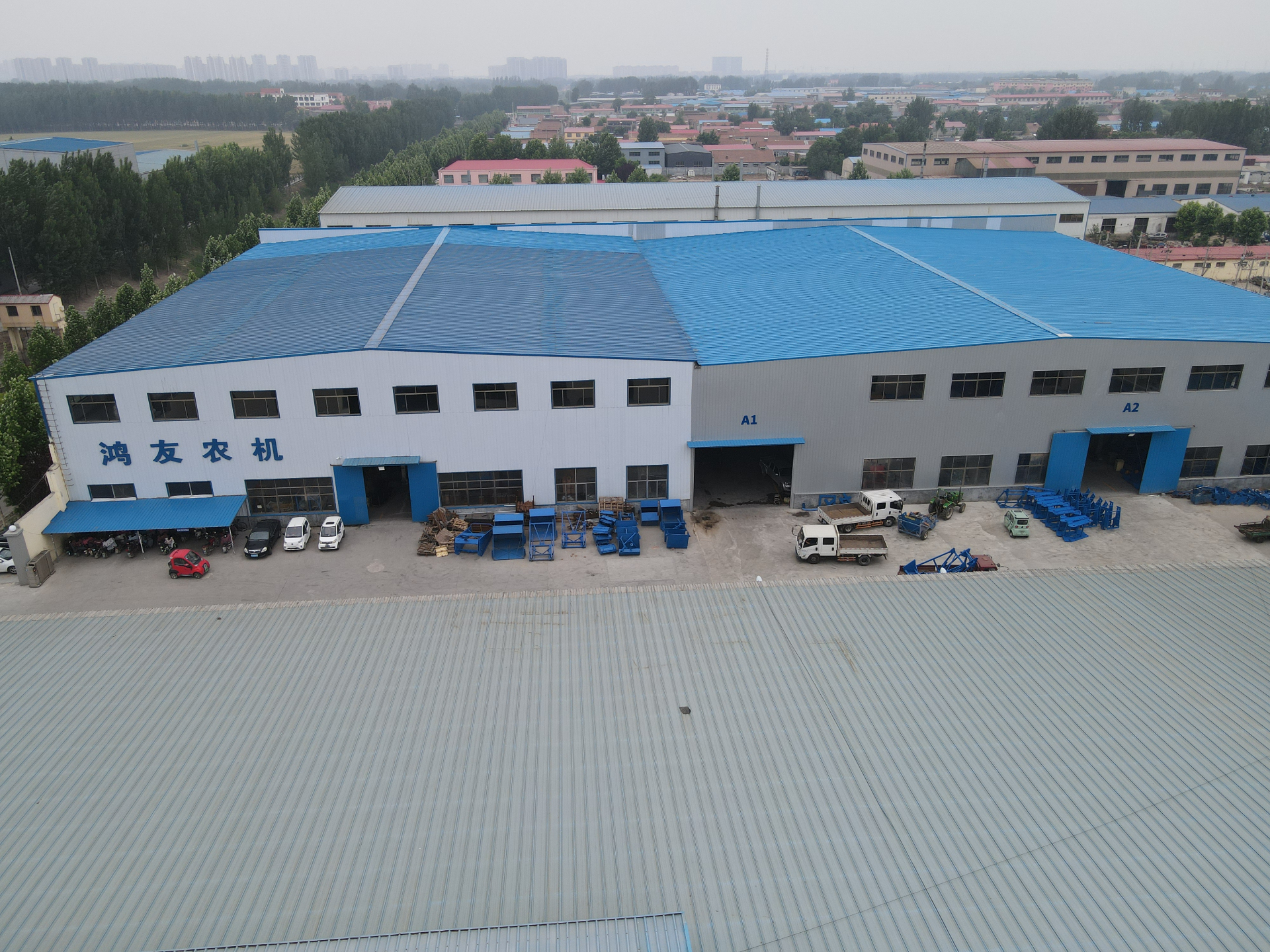 HONGYOU workshop A1 and A2 exterior with staged machinery