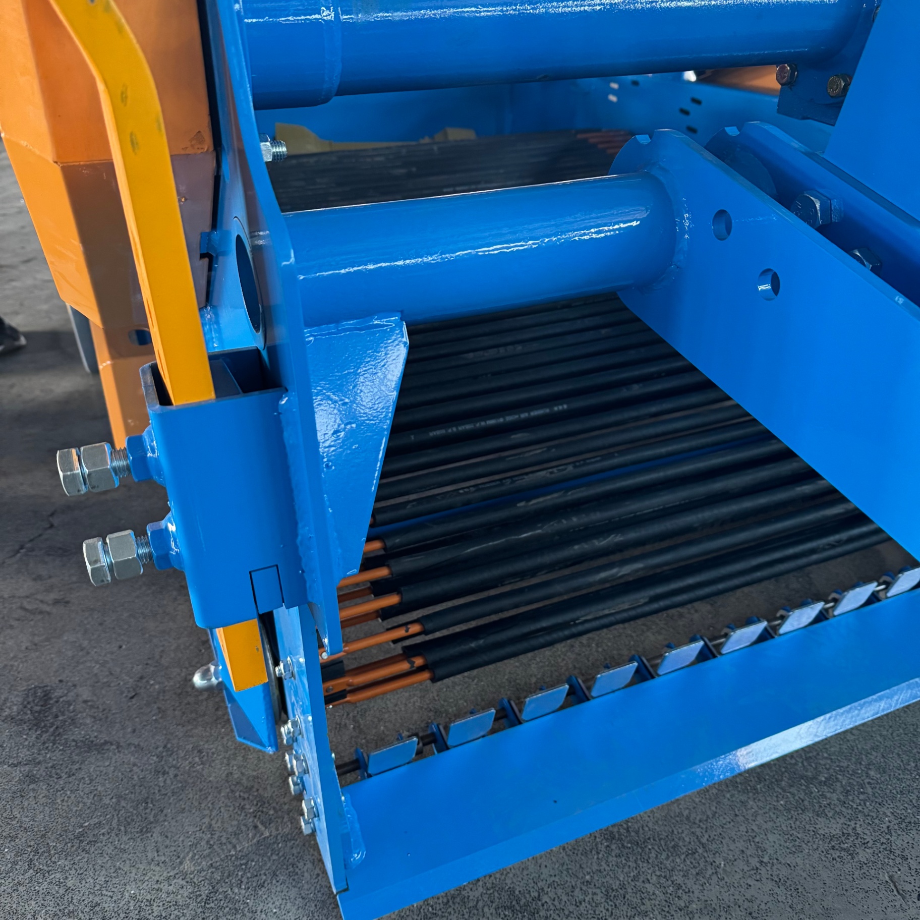 Close-up — rod conveyor and crop channel detail