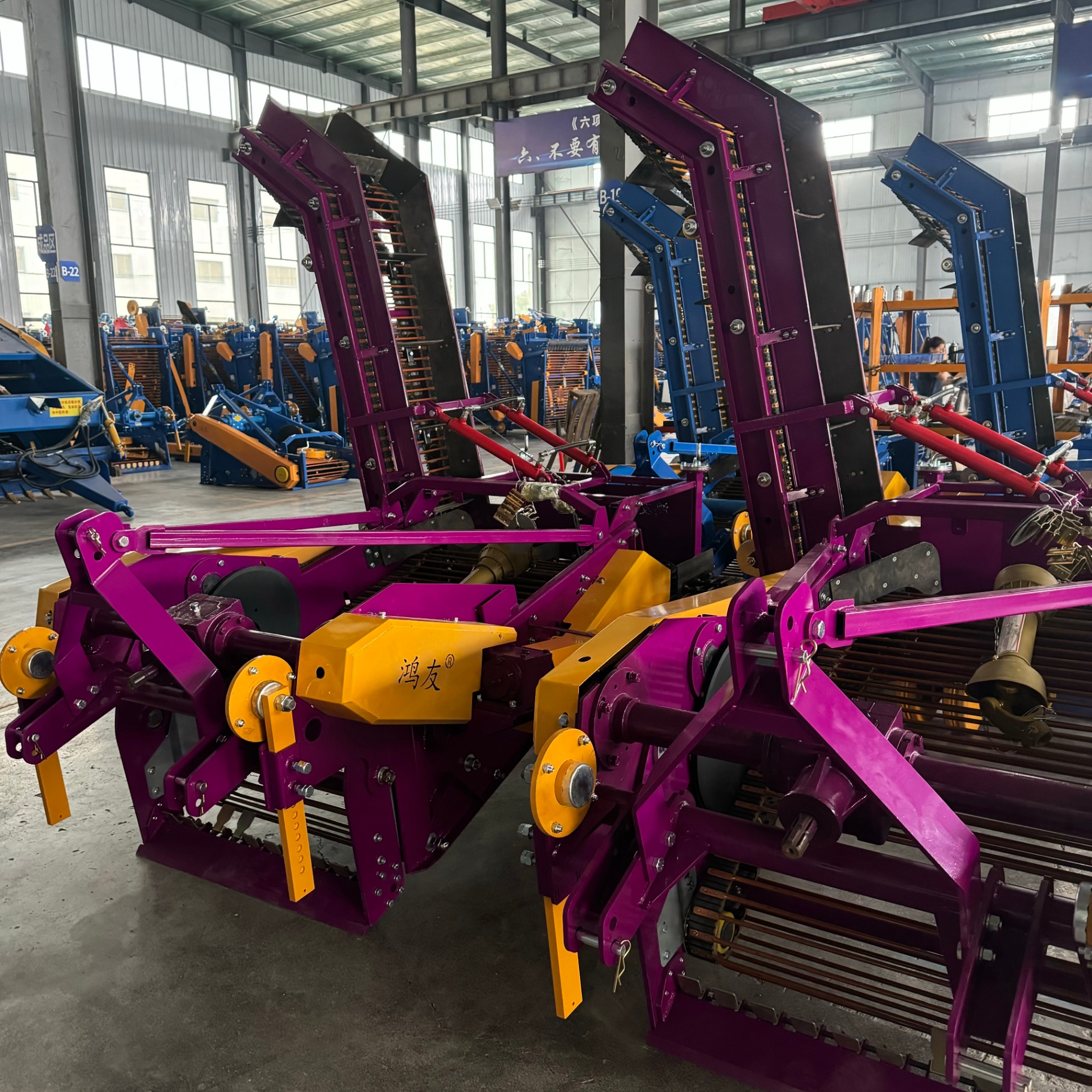 Workshop view — twin units showing elevator and frame