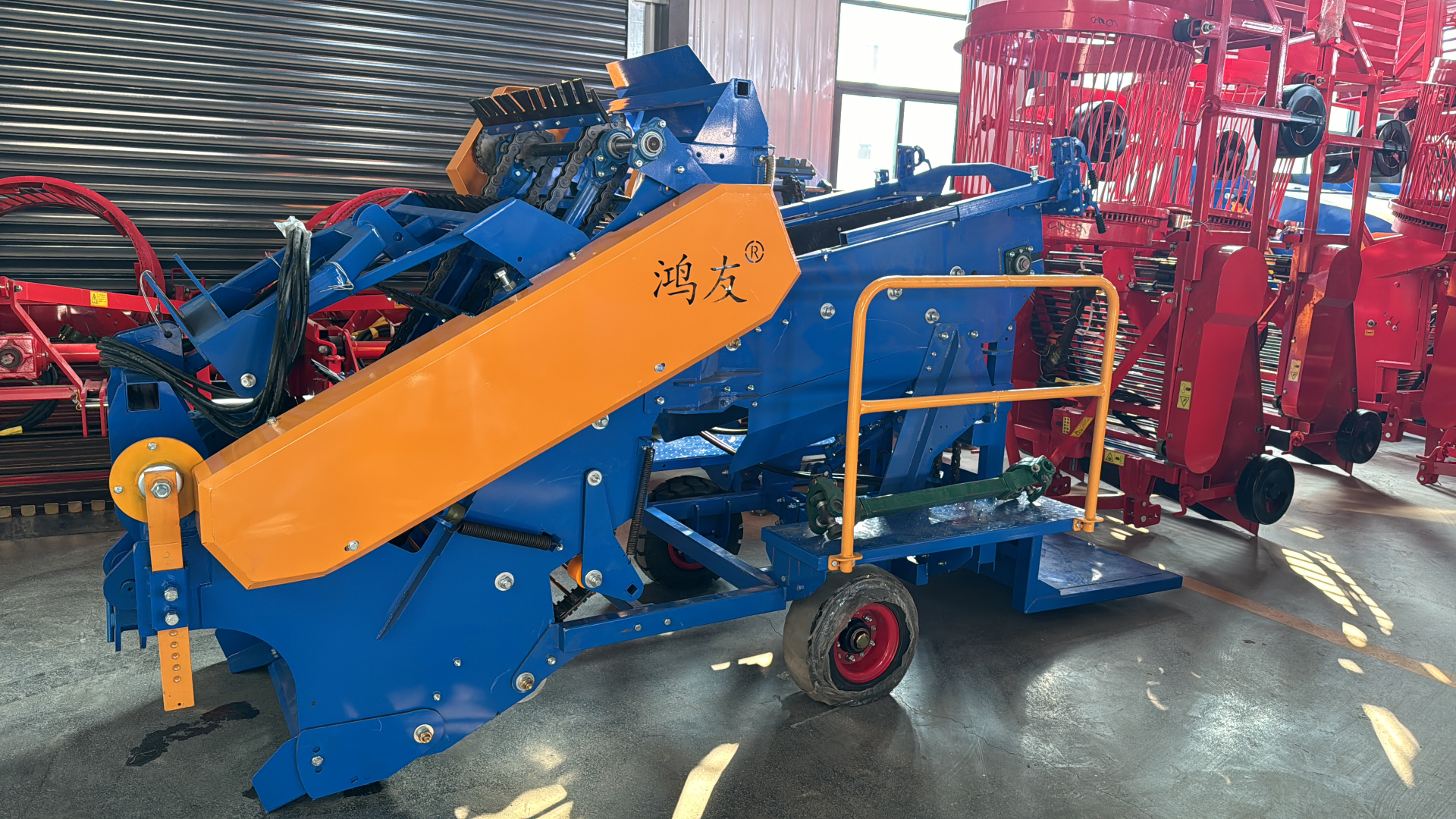 Factory side view — conveyor cover and operator platform